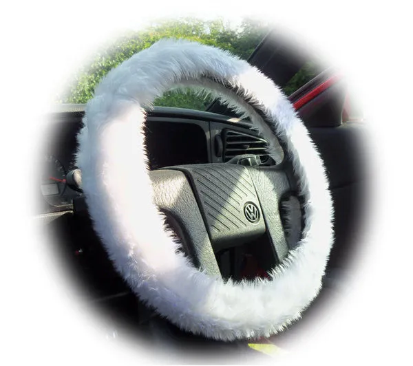 White fluffy steering wheel cover and matching faux fur seatbelt pads